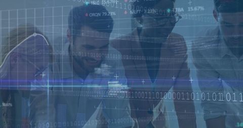 Diverse team analyzing digital financial data and stock market trends