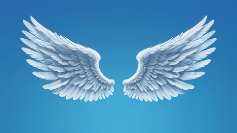 Heavenly white feathers: angel wings on atmospheric blue