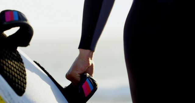 Surfer Holding Surfboard at the Beach - Download Free Stock Images Pikwizard.com