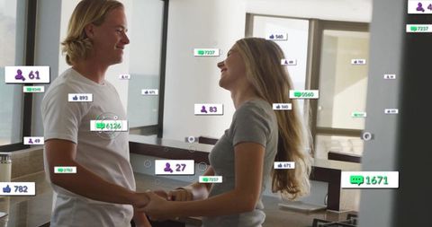 Couple Holding Hands Surrounded by Social Media Icons in Modern Kitchen