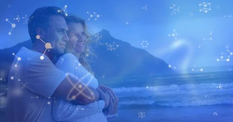 Mature couple embracing on beach, gazing toward horizon with digital network overlay