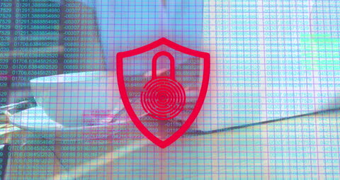 Digital Security Concept with Lock Shield Overlaying Laptop Use