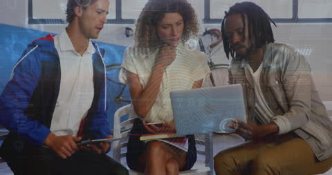 Diverse Business Team Collaborating on Technology Project