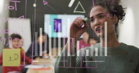 Woman Presenting Data Insights on Transparent Board - Download Free Stock Images Pikwizard.com