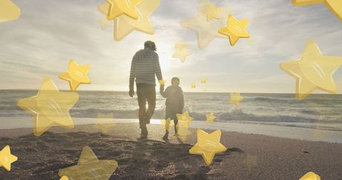 Father and Son Strolling Beach at Sunset with Starry Overlay