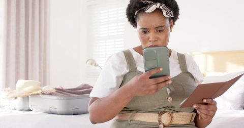 Woman examining travel details troubled overpassport details