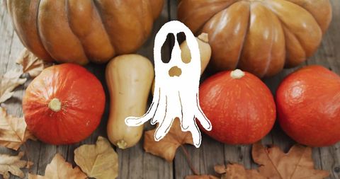 Ghostly Apparition Among Pumpkins and Autumn Leaves