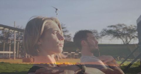 Couple Rowing Together Outdoors for Fitness and Wellness