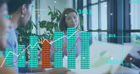 Business Team Analyzing Data Trends with Digital Graphics