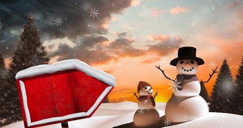 Festive snowmen under evening sky with blank road sign