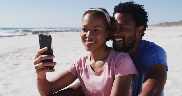 African american couple smiling taking selfie with smartphone on the beach - Download Free Stock Photos Pikwizard.com