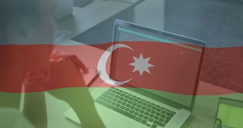 Woman Coding on Laptop with Azerbaijani Flag Overlay