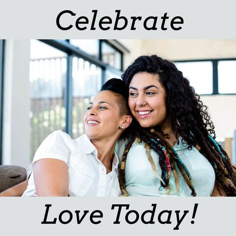 Diverse lesbian couple embracing and smiling