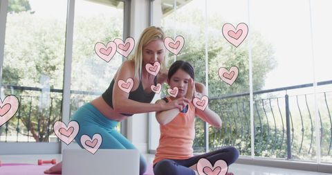 Mother and Daughter Yoga with Digital Hearts Visual Effect