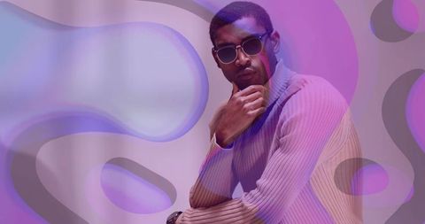 Man in Turtleneck and Sunglasses with Abstract Purple Overlay