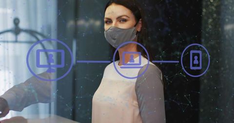 Masked receptionist standing behind transparent counter with digital network overlay
