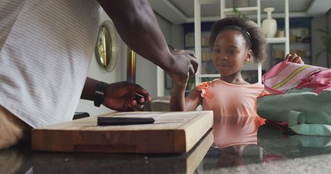 Father and Daughter Sharing Quality Time Preparing Breakfast