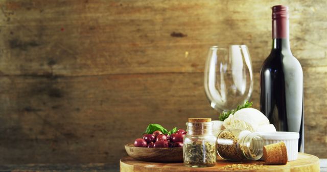 Rustic Wine Tasting Setting with Wine Bottle, Glasses, and Condiments on Wooden Table - Download Free Stock Images Pikwizard.com