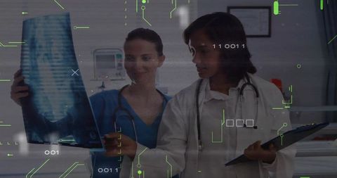 Nurse and Doctor Analyzing X-Ray with Digital Technological Interface