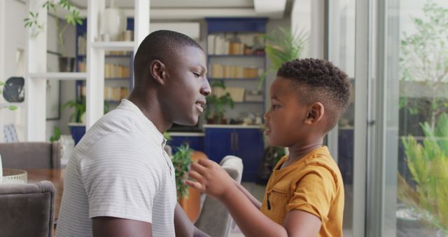 Father and Son Having Heart-to-Heart Conversation at Home - Download Free Stock Images Pikwizard.com