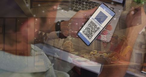 Man Holding Vaccination Passport on Smartphone and People Dinning Together - Download Free Stock Images Pikwizard.com