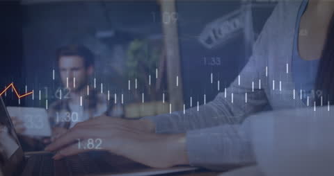 Person Working on Laptop with Digital Financial Overlay