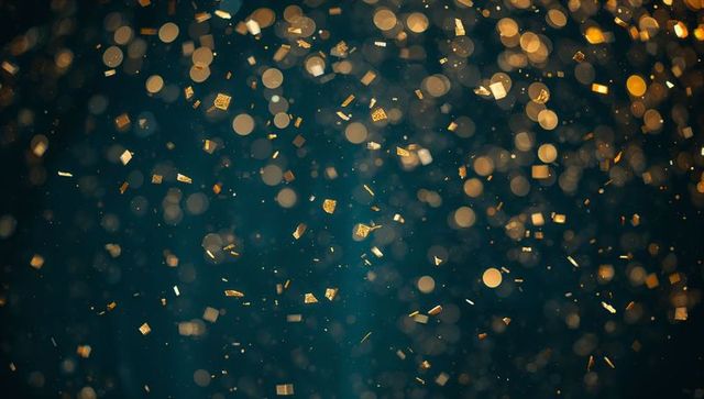 Golden Confetti with Bokeh Lights on Teal Background