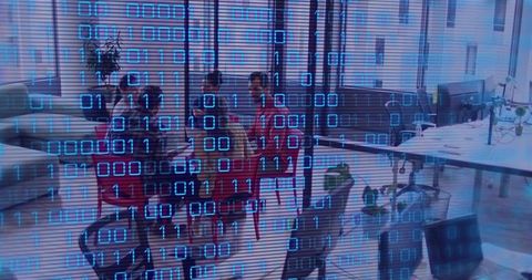 Team discussing strategy at round table with binary data overlay in coworking office