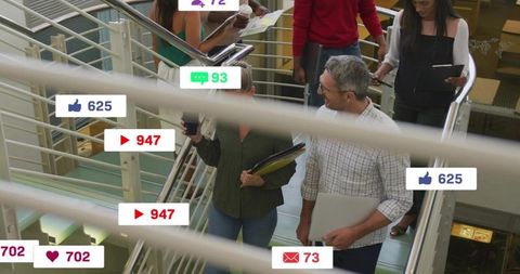 Office team walking staircase checking smartphone with floating social media notifications