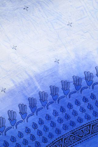 Indigo ombre cotton textile with hand block floral print, vine motifs and ornamental border