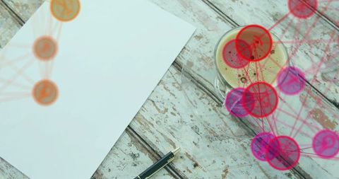 Blank notepad resting on weathered wood with fountain pen coffee cup and network overlay