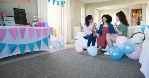 Joyful Baby Shower with Friends in Colorful Living Room