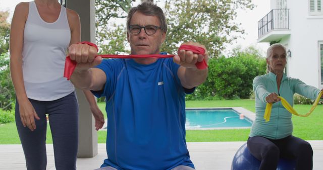 Active Seniors Exercising with Resistance Bands in Outdoor Fitness Class - Download Free Stock Images Pikwizard.com