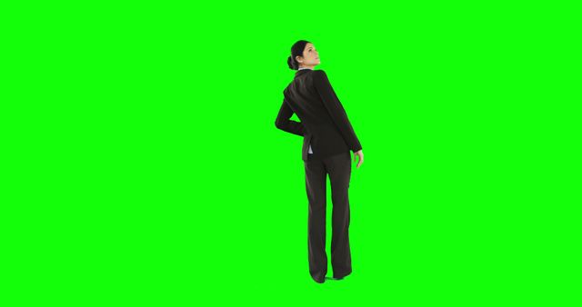 Businesswoman in Black Suit Posing Against Green Screen Background - Download Free Stock Images Pikwizard.com