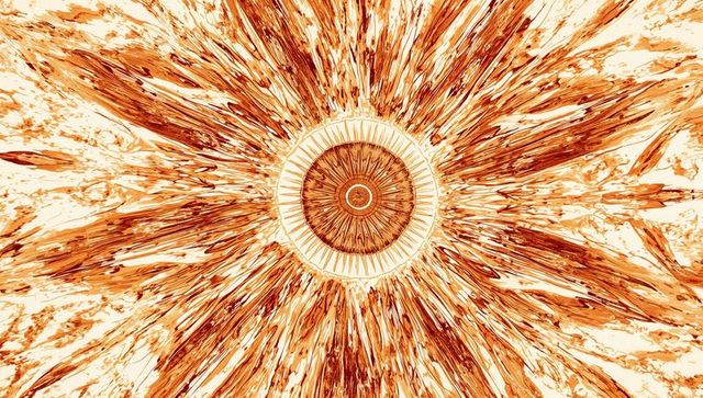 Amber sunburst mandala with radiating streaks and toothed concentric rings texture