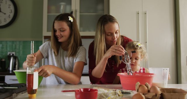 Mother and Daughters Cooking in Kitchen - Download Free Stock Images Pikwizard.com