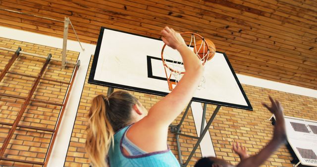 Teen Basketball Players Competing for the Ball Near Hoop - Download Free Stock Images Pikwizard.com