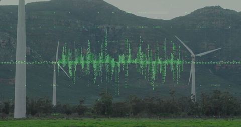 Wind turbines generating power with data visualization overlay