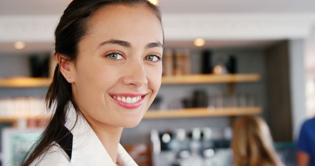 Smiling Female Barista in Coffee Shop - Download Free Stock Images Pikwizard.com