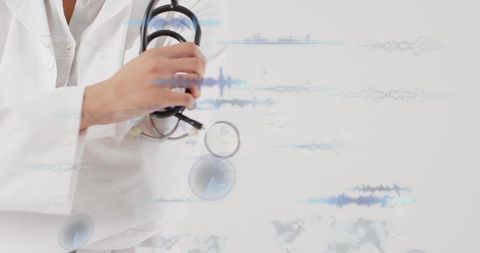 Woman Doctor Holding Stethoscope with Digital ECG Waveforms and Medical Analytics