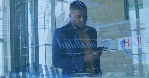 Businessman Analyzing Financial Markets with Technology Integration - Download Free Stock Images Pikwizard.com