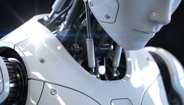 Displaying white humanoid robot with exposed pistons, polished armor and hydraulic actuators