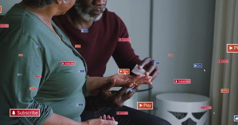 Caring relationship of son giving medication to senior mother at home