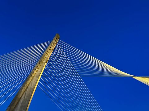 Modern Cable-Stayed Bridge Against Clear Blue Sky