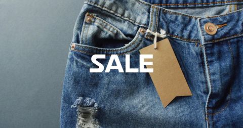 Denim jeans highlighted with sale text overlaid