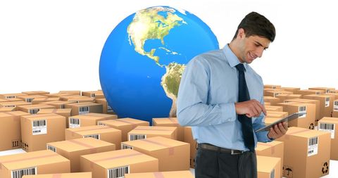 Man Using Tablet with Boxes and Globe Symbolizing Global Shipping
