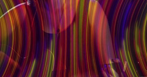 Vibrant Multicolor Light Trails in Dimly Lit Environment