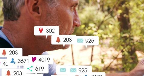 Man Receiving Notifications on Smartphone Outdoors