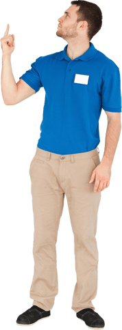 young salesman pointing upward in blue polo - Download Free Stock Videos Pikwizard.com