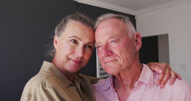 Caucasian senior couple embracing each other at home. staying at home in self isolation in quarantine lockdown